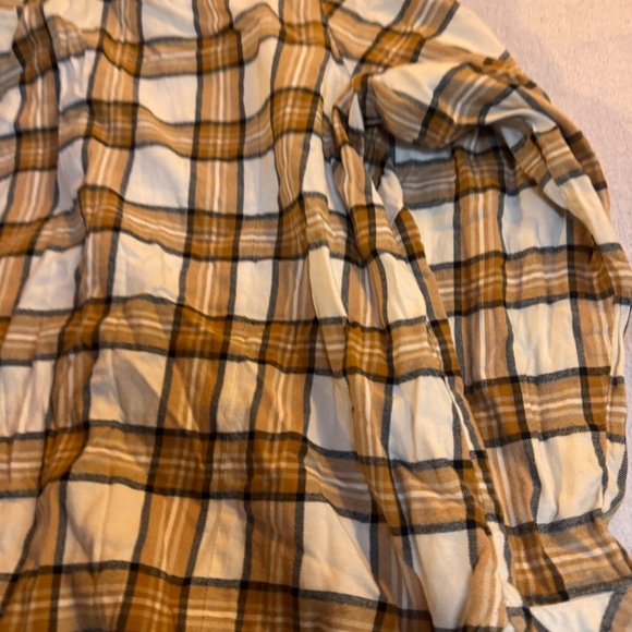 Stylish plaid button-up shirt with a classic design. Features a mix of brown and - Picture 7 of 8